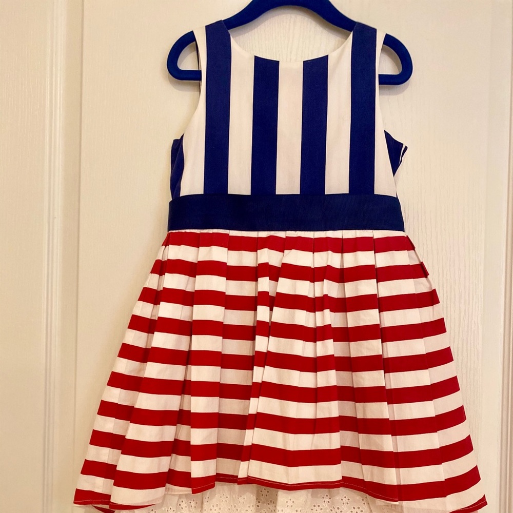 Dress has longer under skirt in back